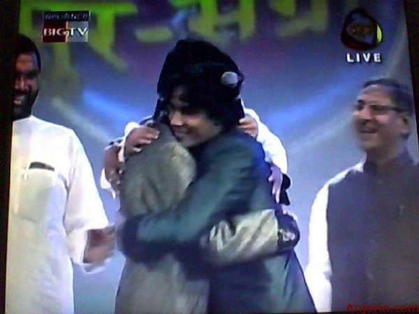 Mohan and Alok embrace each other
